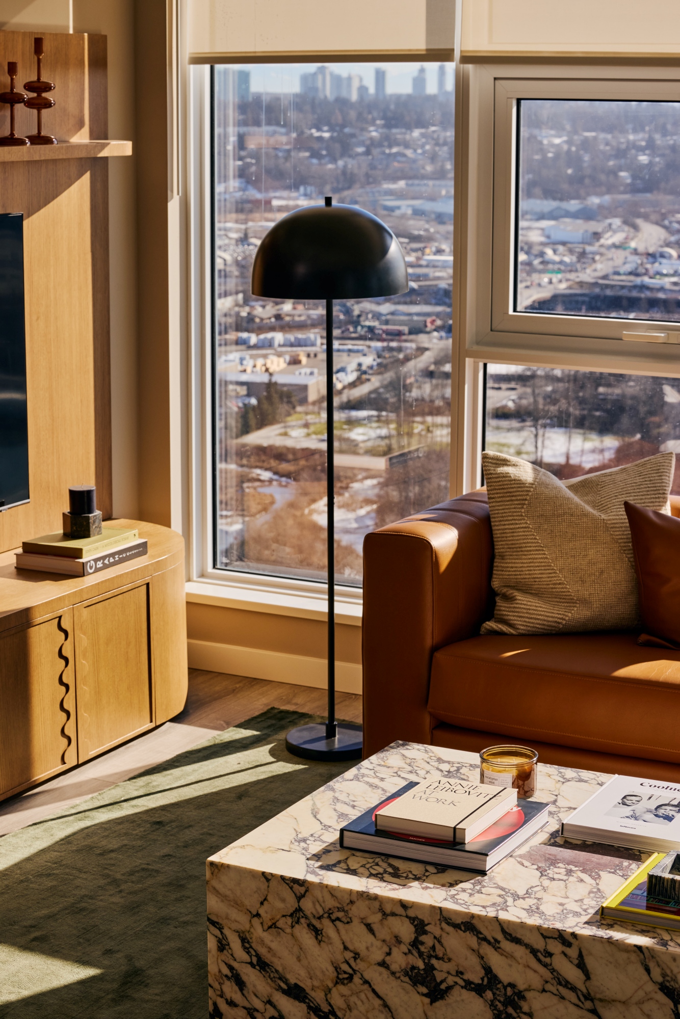 Steel shade black mushroom lamp in a mid century modern inspired living room.