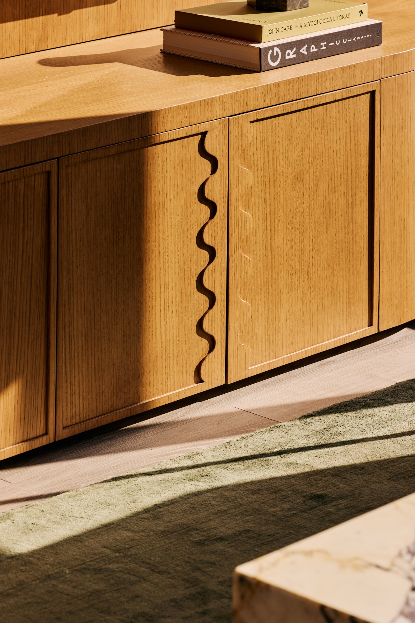 Detail of a wave design in millwork designed by Karin Bohn and the House of Bohn team.